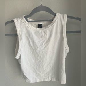 White tank semi-crop top.